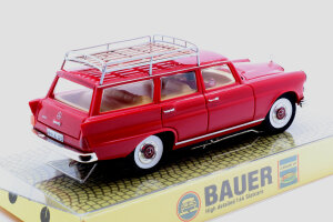Mercedes Benz Universal station wagon brownish red with a roof carrier