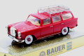 Mercedes Benz Universal station wagon brownish red with a roof carrier